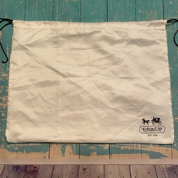 Coach Handbags - Coach Leatherware White Storage Bag